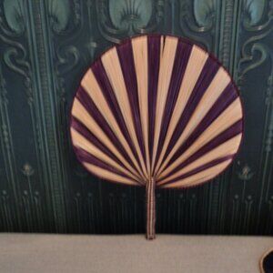 vintage wicker fan wall decor
